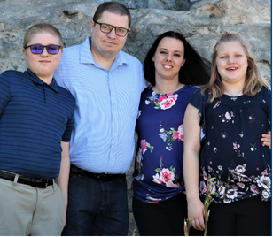 Nick Hoheisel with his wife Misti and their children